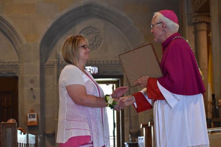 Bishop Terry LaValley and Starr L. Burk of Holy Cross Parish, Plattsburgh