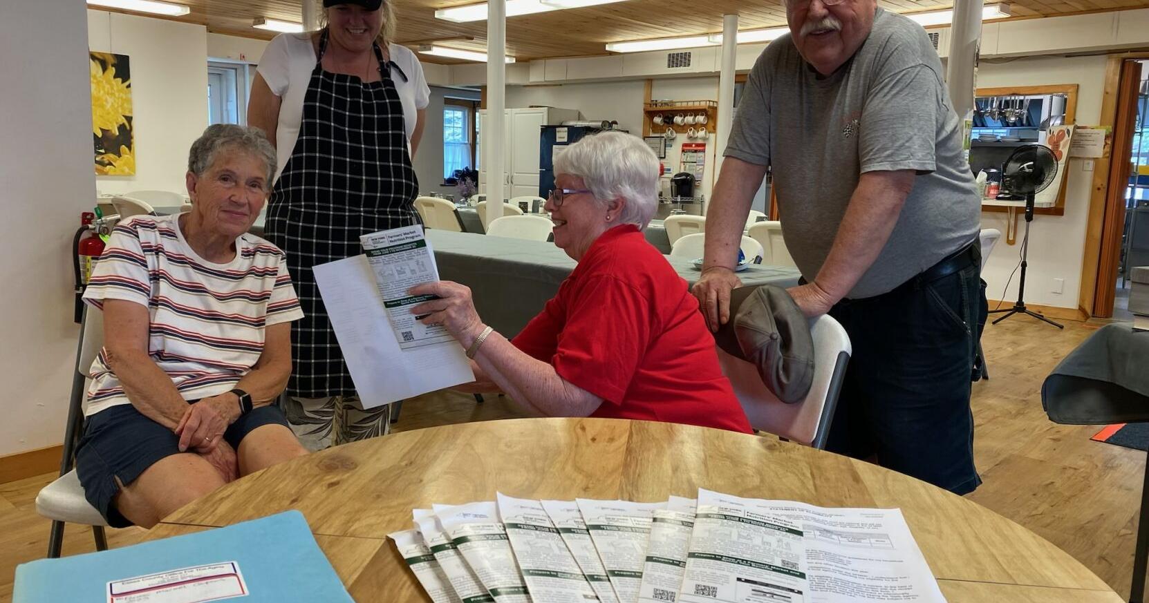 Aging Offices distribute Farmer Market Coupon booklets - Vimarsana News