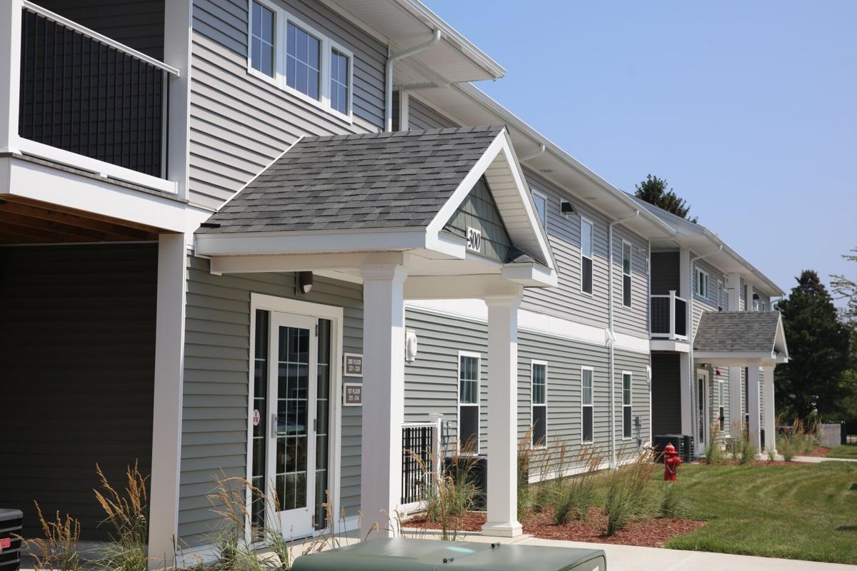 Great Day for Housing Officials celebrate two new, affordable housing