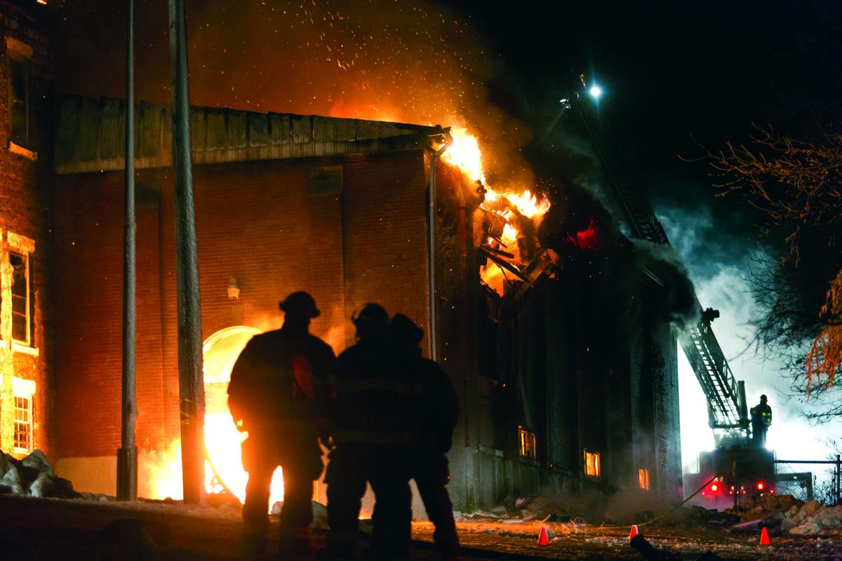 Former Champlain school burns News