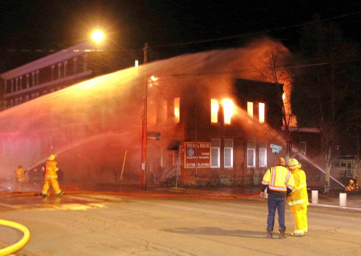 Apartment house fire threatens other buildings Local News