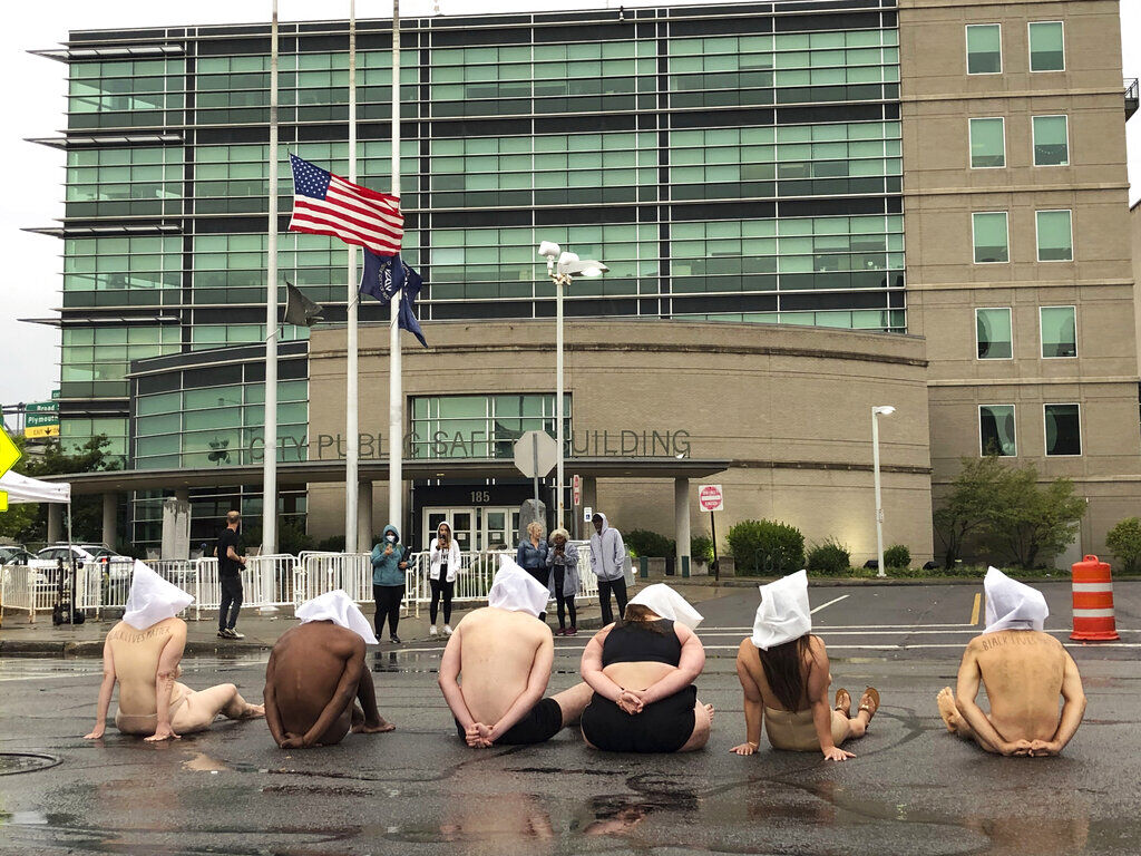 Naked with spit hoods on, protesters decry Prudes death News pressrepublican