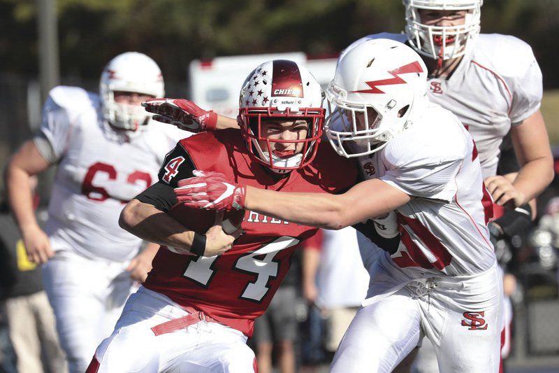 Saranac captures school's first football championship Local News