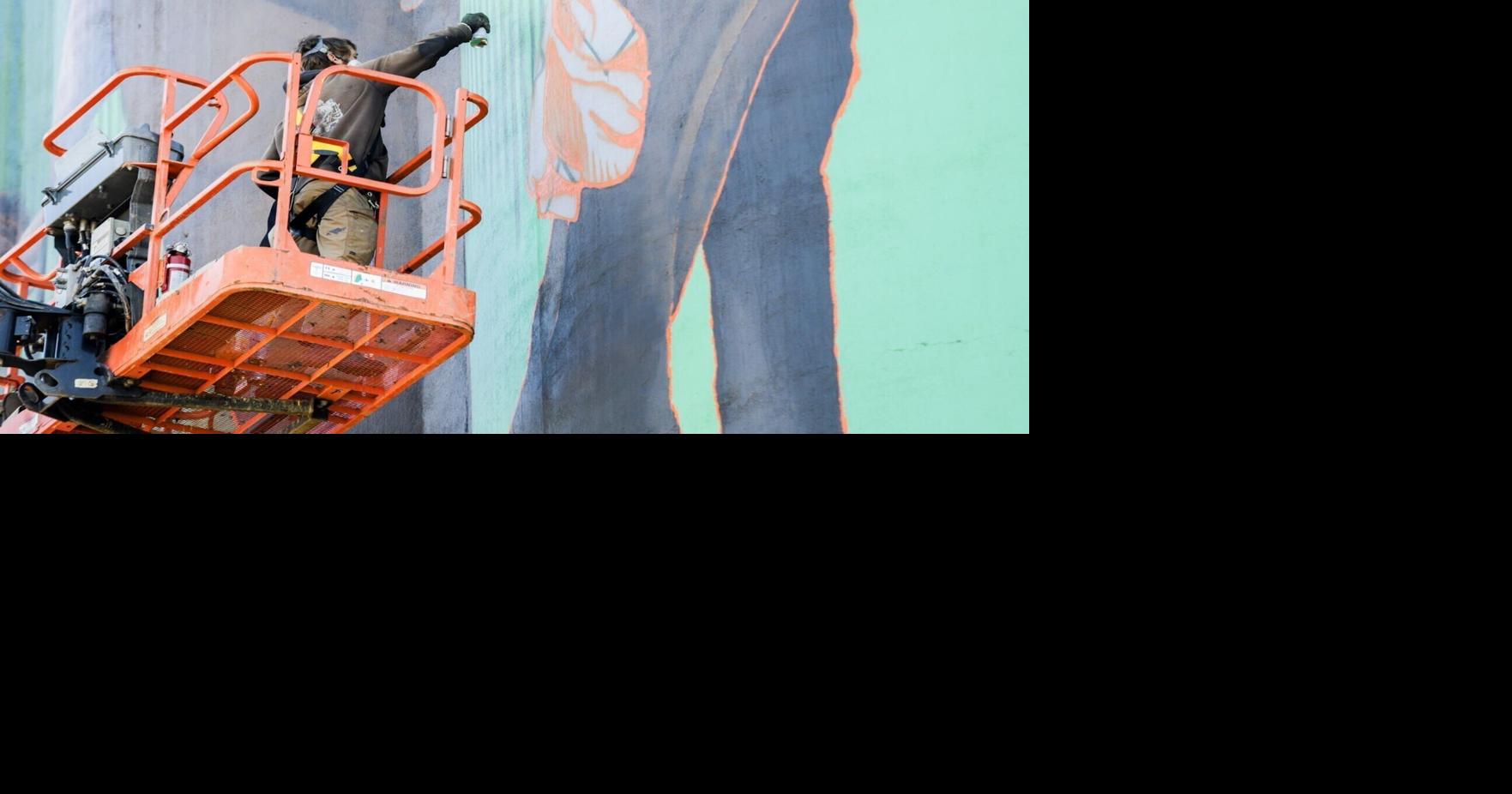 Capped cans: Wind was the enemy, Glendive the inspiration as towering mural nears completion