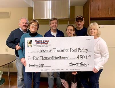 COMMITTEE DONATES TO FOOD PANTRY