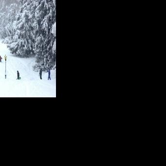 US winter storm brings rare hush to snowy New York