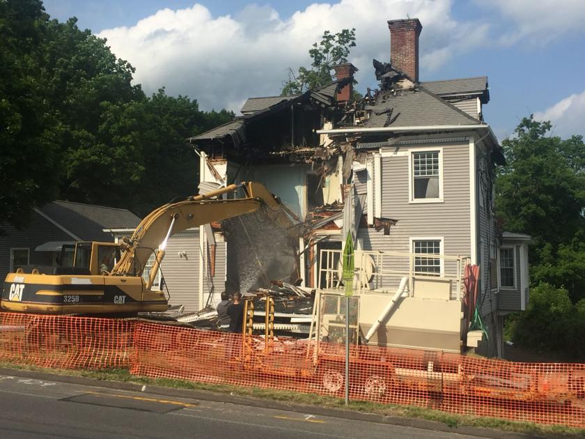 DAMAGED HOUSE DEMOLISHED Community News