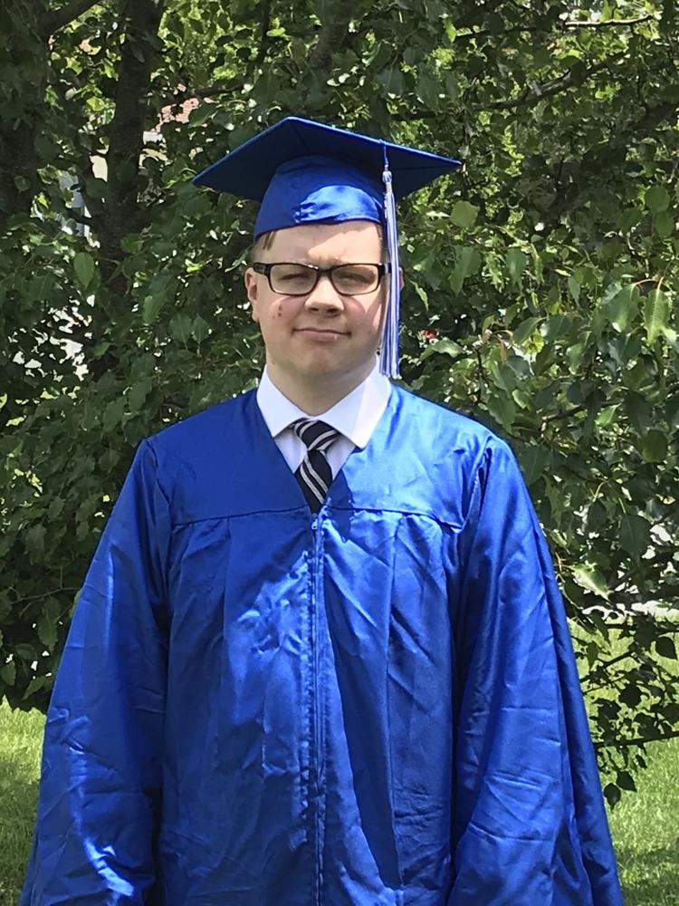 Teenager with autism defies the odds to graduate on time at PHS News