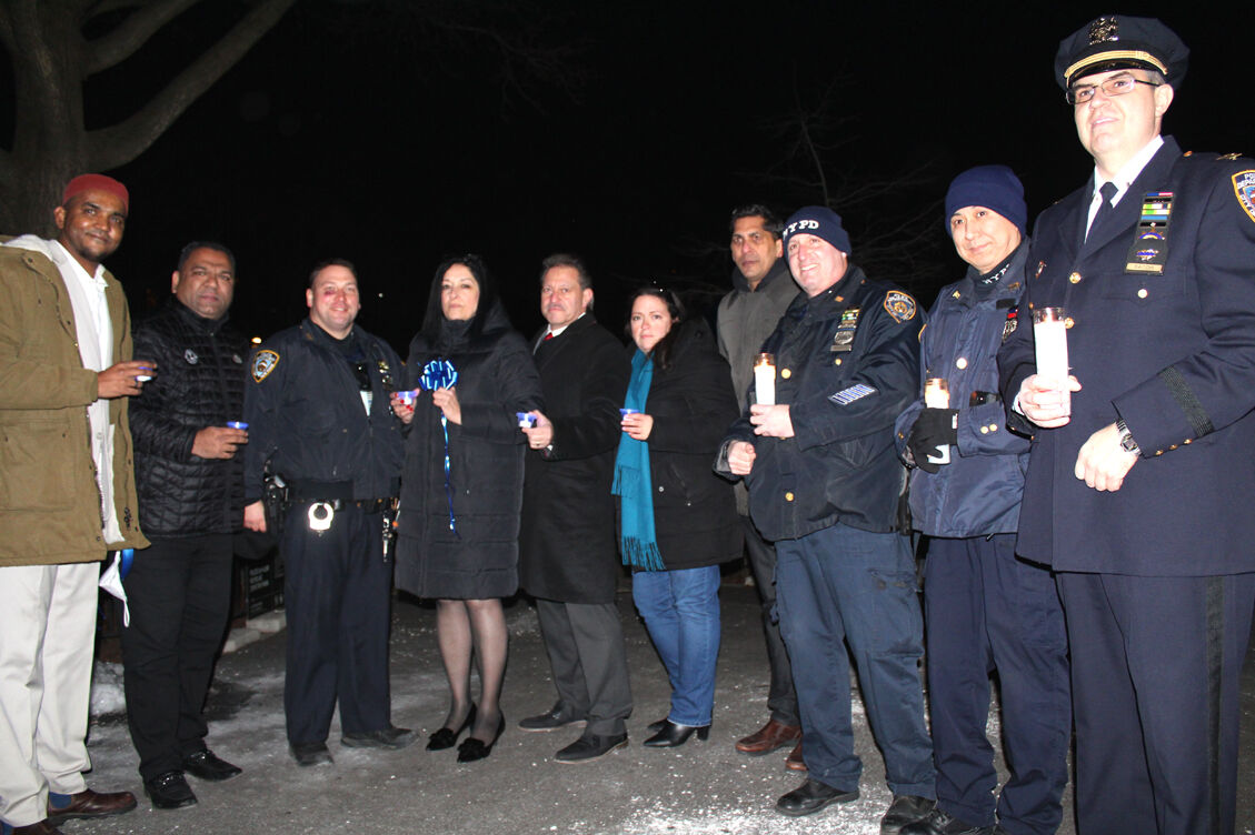 Vigils Honor Slain Officers | | Qchron.com