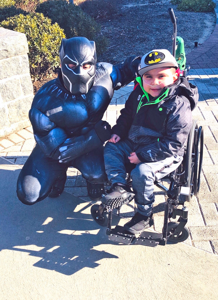 Superheroes treat the kids at St. Mary’s 1