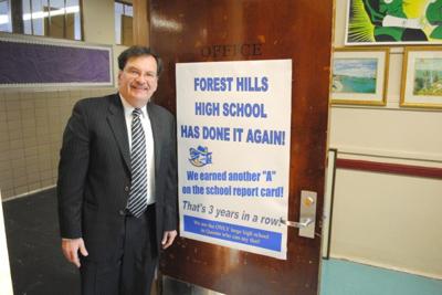 hills forest saul qchron grade makes principal hallway door sign he main posted school