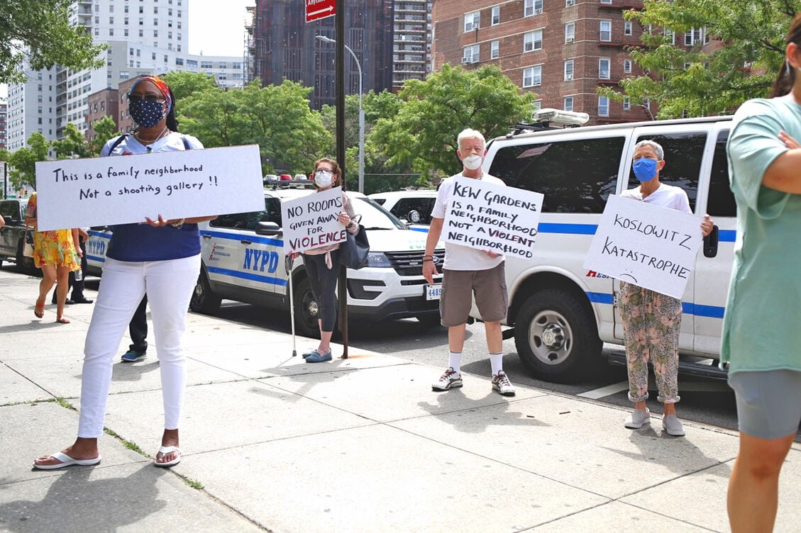 Community rallies against Umbrella Hotel | | qchron.com