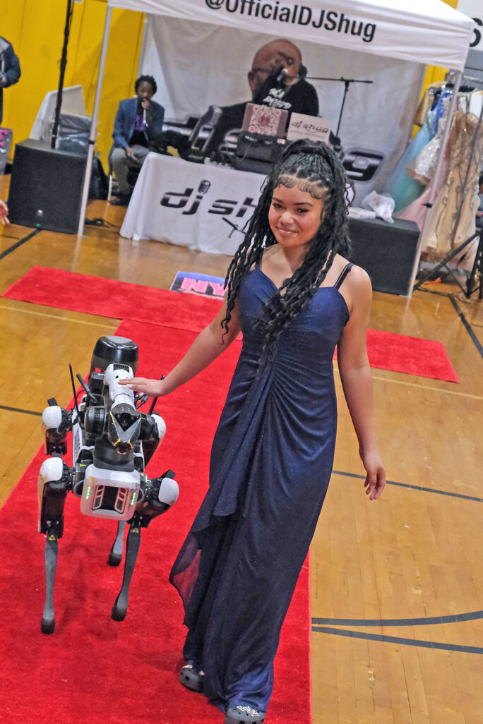 Teens all smiles at NYPD’s 10th Prom Impact | | qchron.com