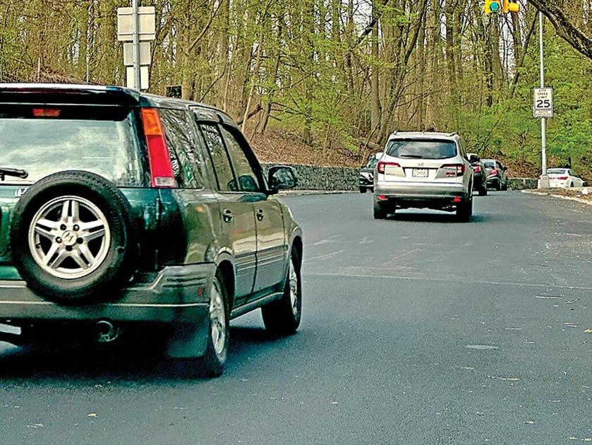 Smooth rides return to Forest Park Drive | | qchron.com