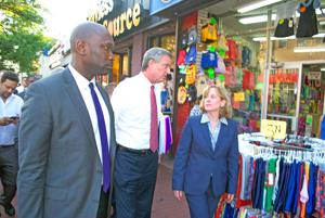 Mayor visits Jamaica small business dist.