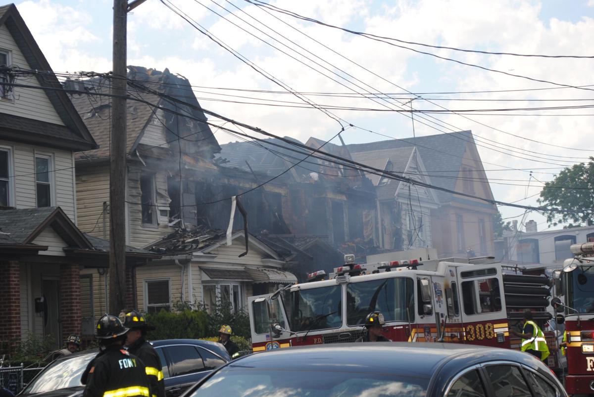 Three dead as fire tears through South Richmond Hill homes 1