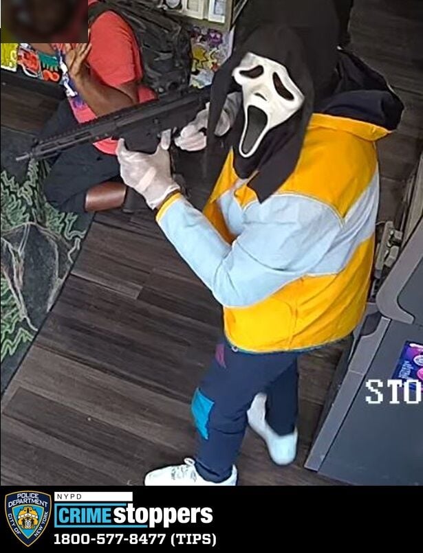 WITH VIDEO: Gunpoint robbers broke out the Halloween mask early 3