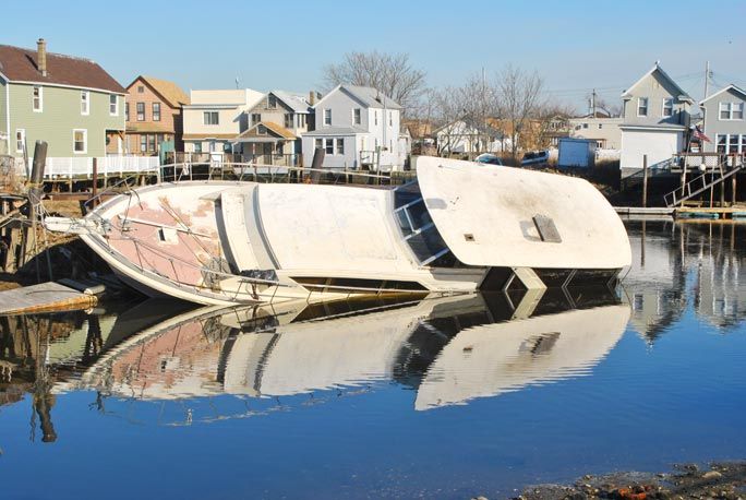 Sailors Decry Boats Sinking Into Creek Queenswide
