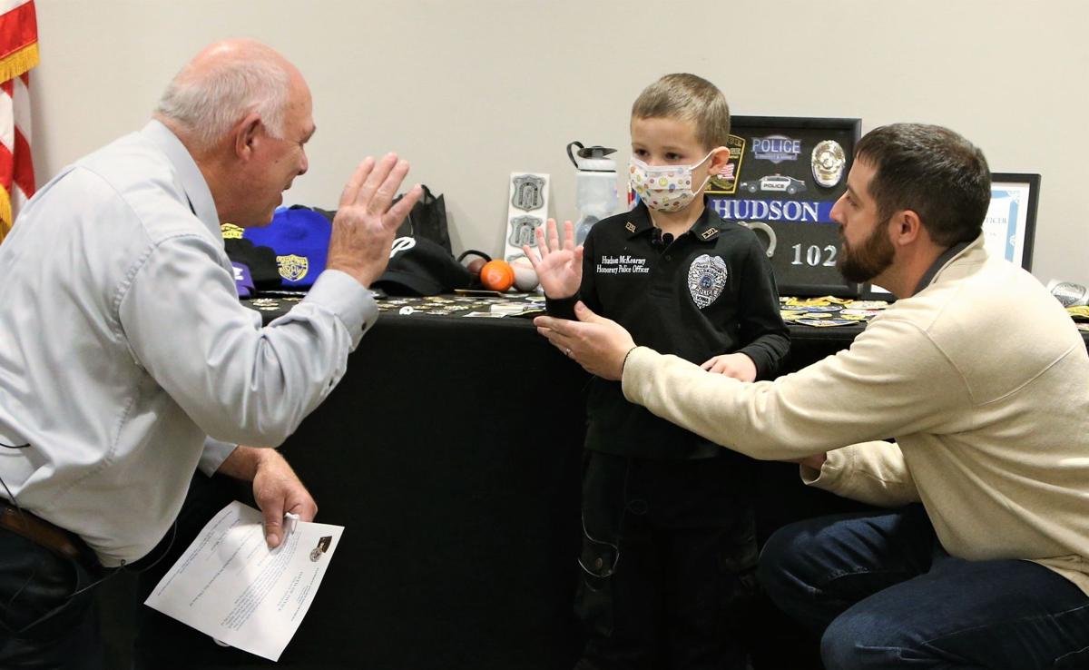 Eldridge boy recovering from leukemia sworn in as honorary police officer | Local Crime & Courts 111221-qc-nws-hudson-010.JPG