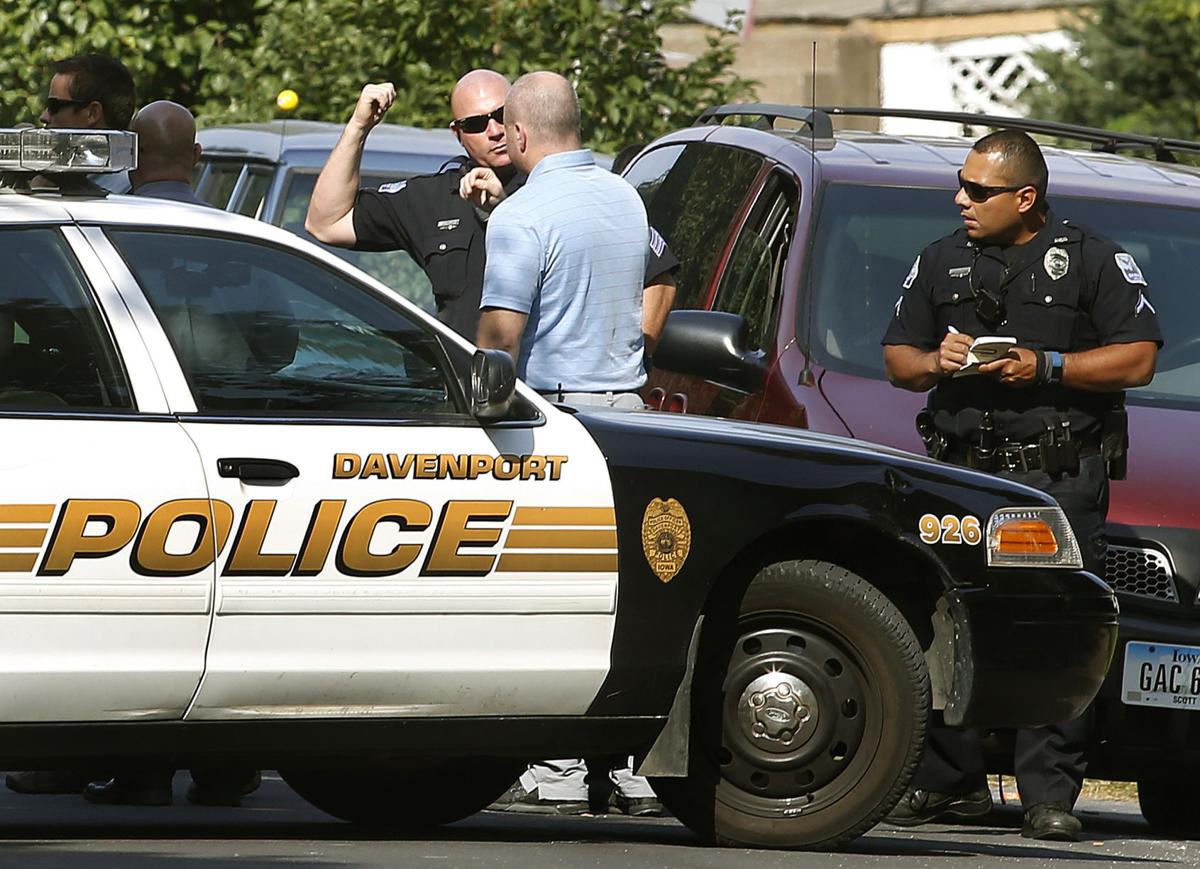 Photos Davenport Police investigate shooting.