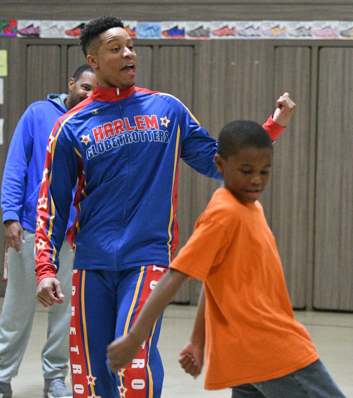 Former Harlem Globetrotter brings 'Stand Tall Against Bullying' campaign to  Martinsville students