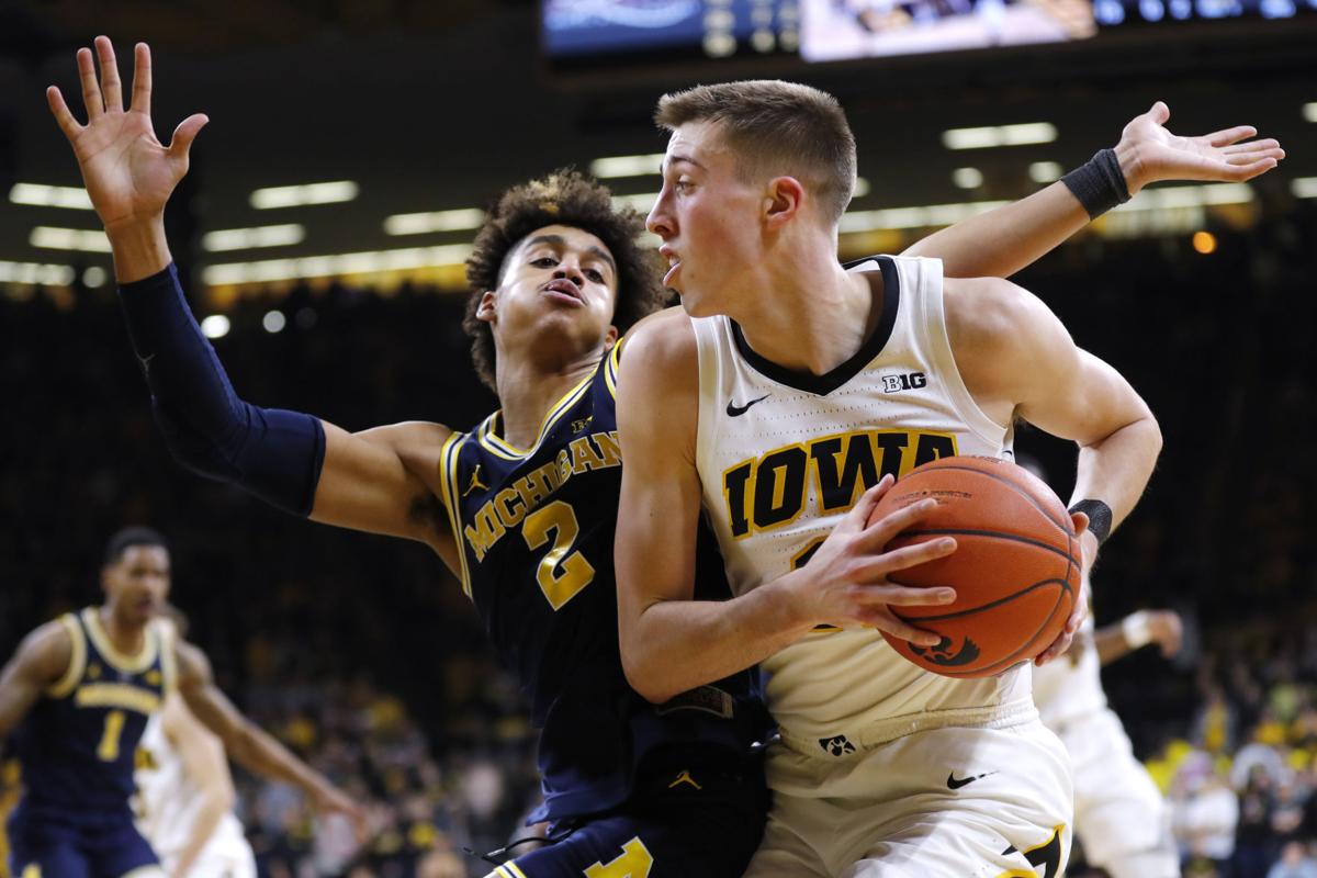 Fans Storm The Court After Iowa Whips Wolverines Iowa Hawkeyes