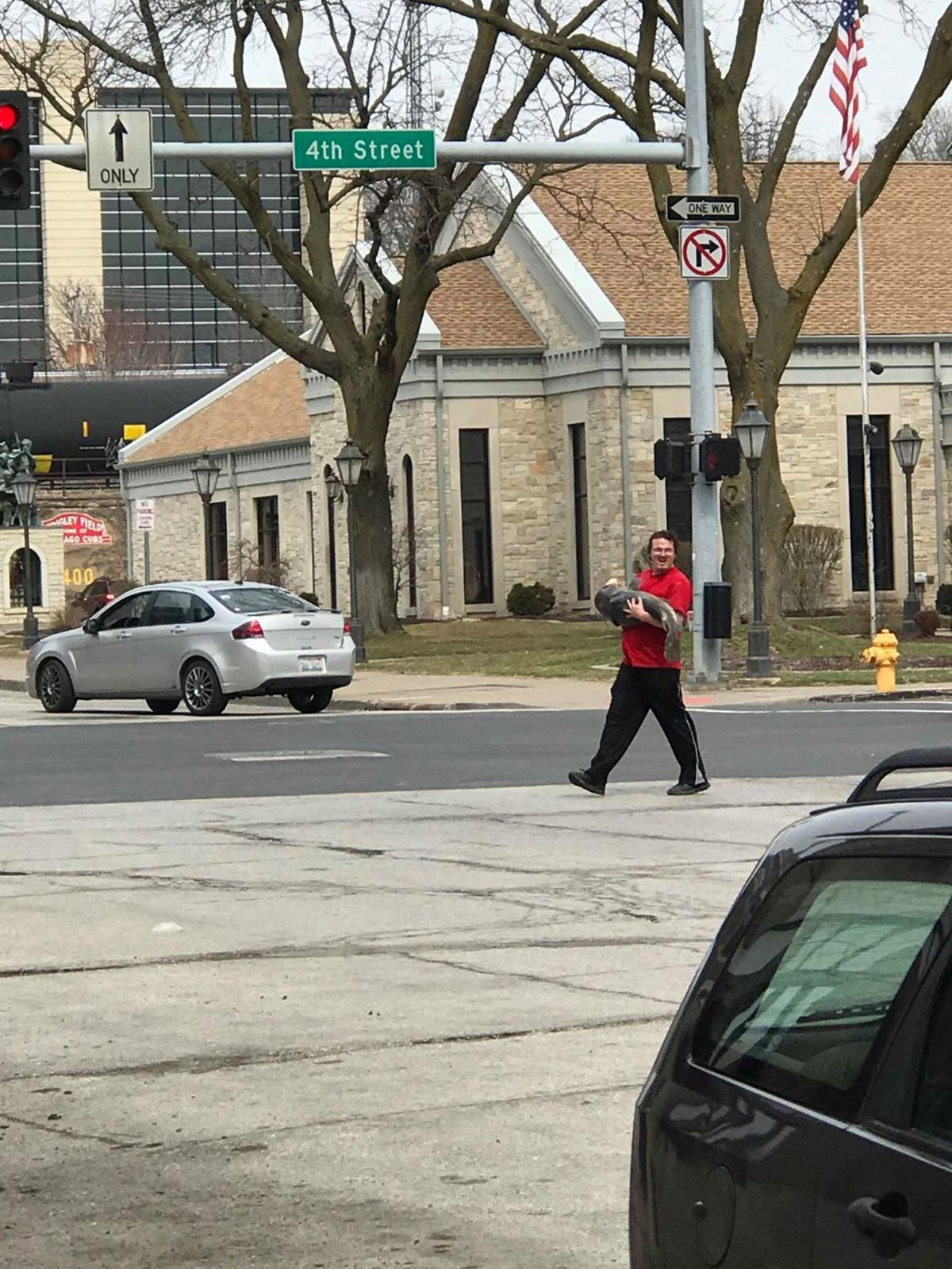Fish Guy Swims In Celebrity After He Carried Catfish Through Downtown Davenport Local News Qctimes Com Fish Guy Swims In Celebrity After He Carried Catfish Through Downtown Davenport Local News Qctimes Com