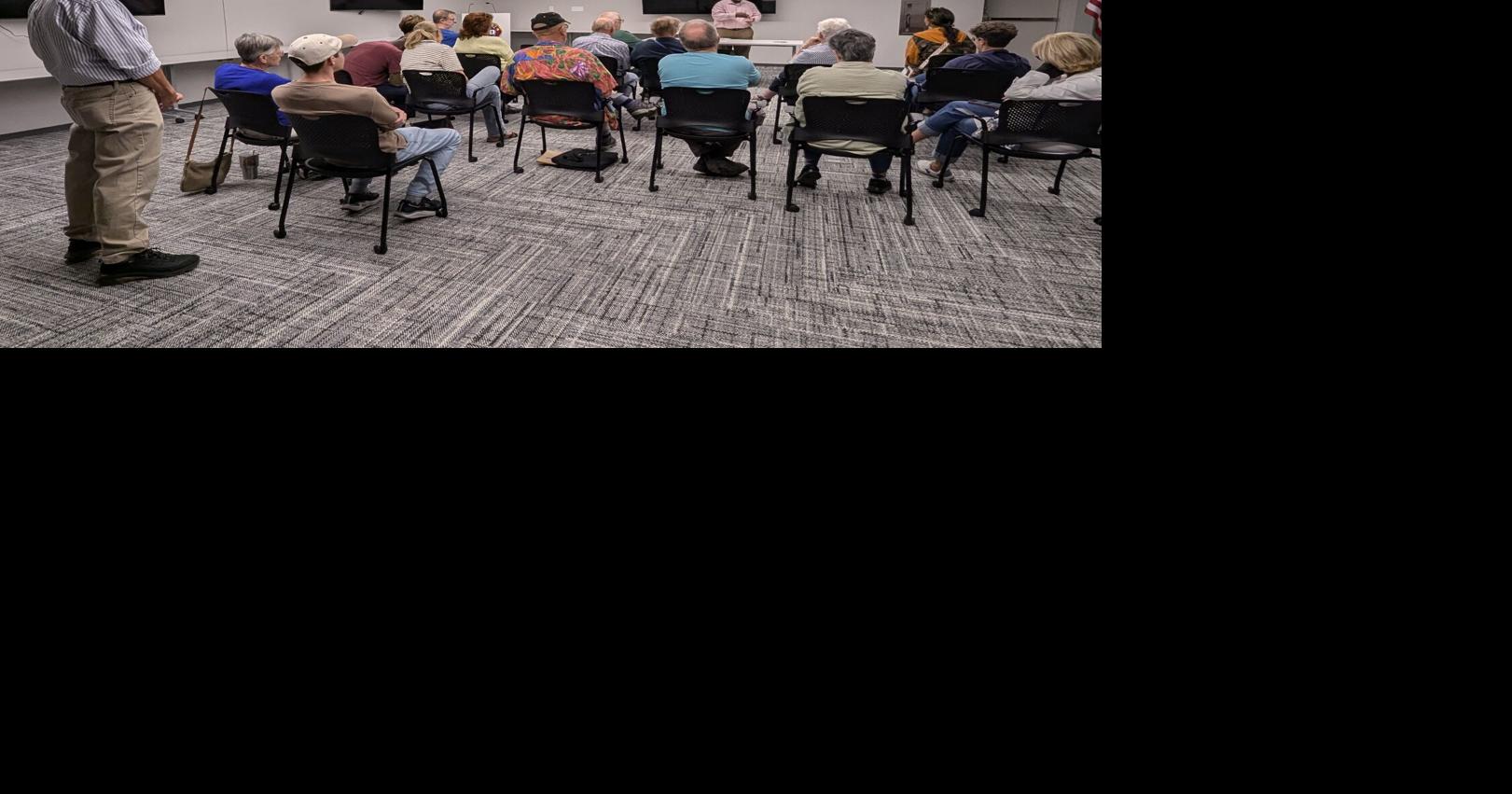 Davenport alder invited a candidate to her ward meeting. The other candidate showed up, too