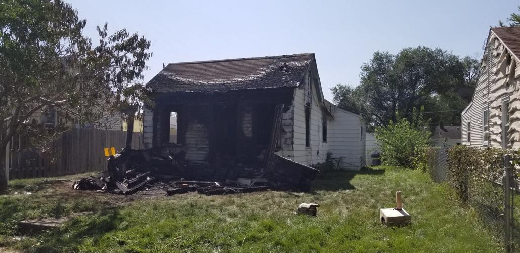 Home heavily damaged in late night fire Monday in Davenport