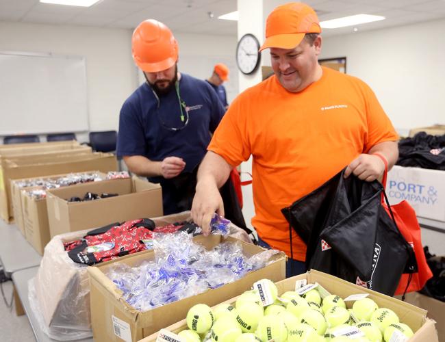 Purina volunteer day assists three QuadCity animal shelters