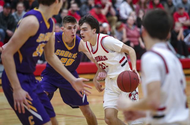 Photos: Maquoketa boys basketball defeats Central DeWitt