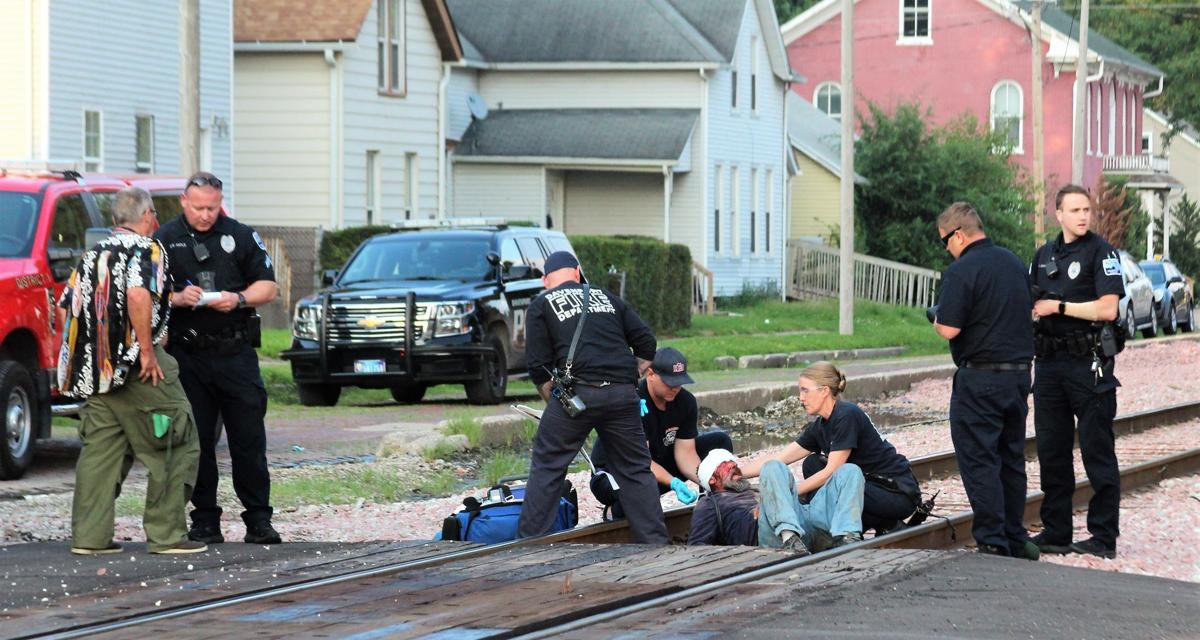 Man dragged by train