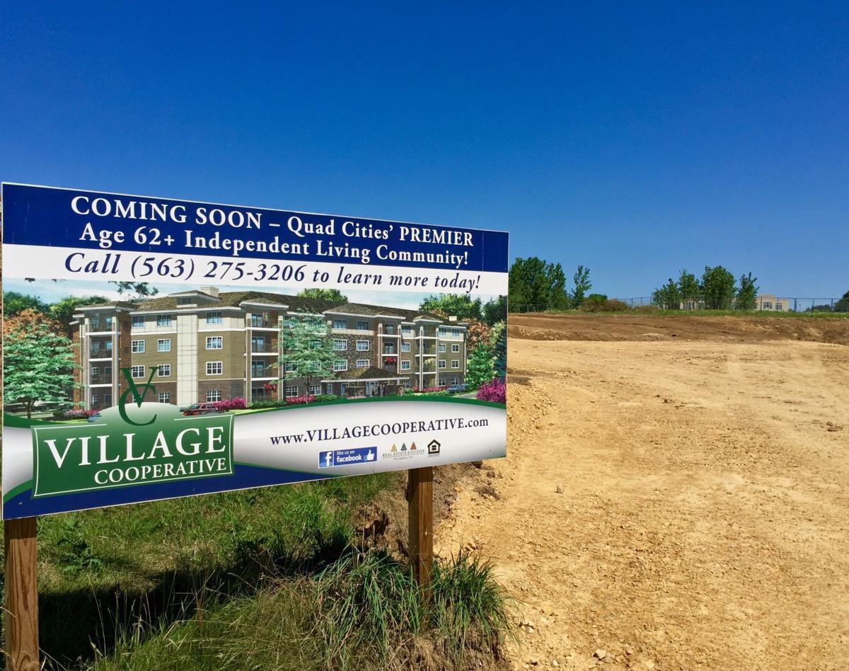 Crews break ground on senior housing coop in Davenport Business