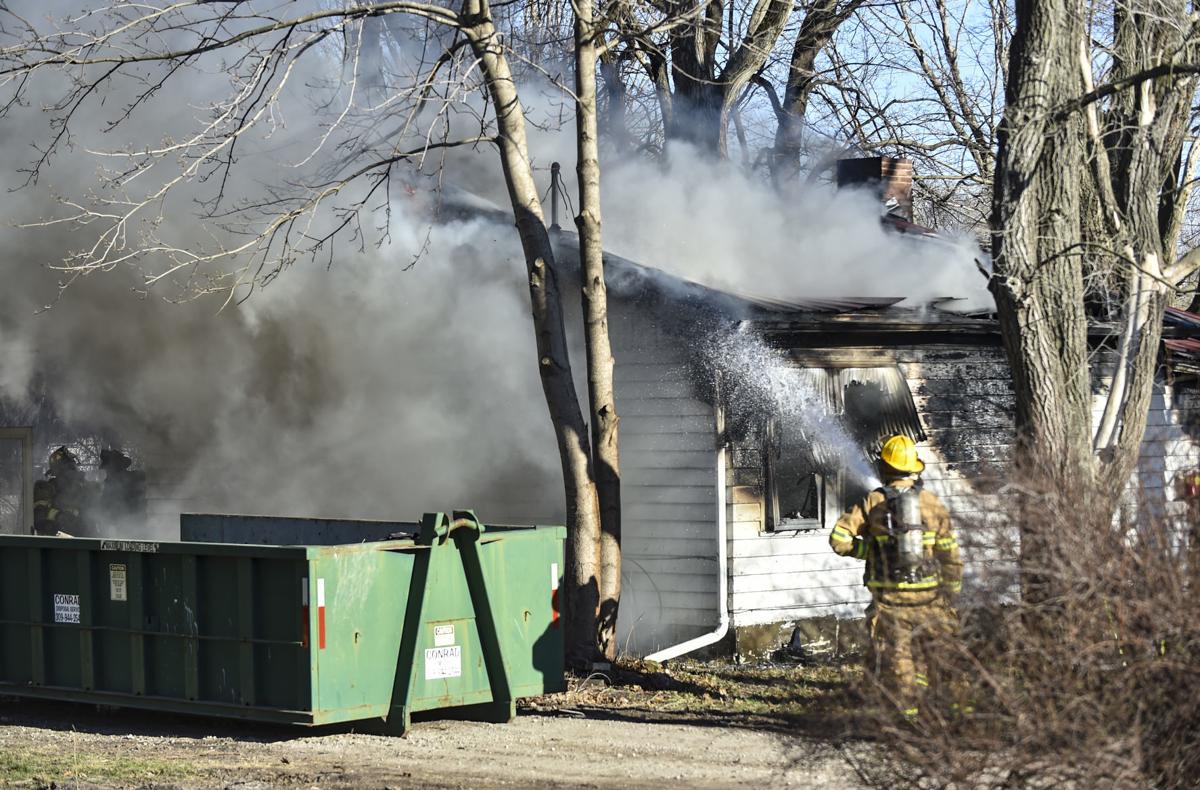 Firefighters battling flames at house in rural East Moline