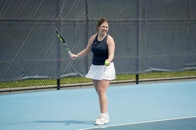 Women's tennis overcomes Carroll