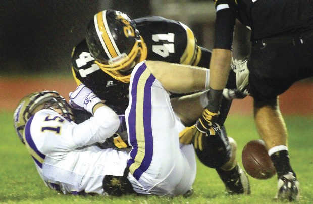 Bettendorf great Pat Angerer kicks off The Score with help from his former  head coach