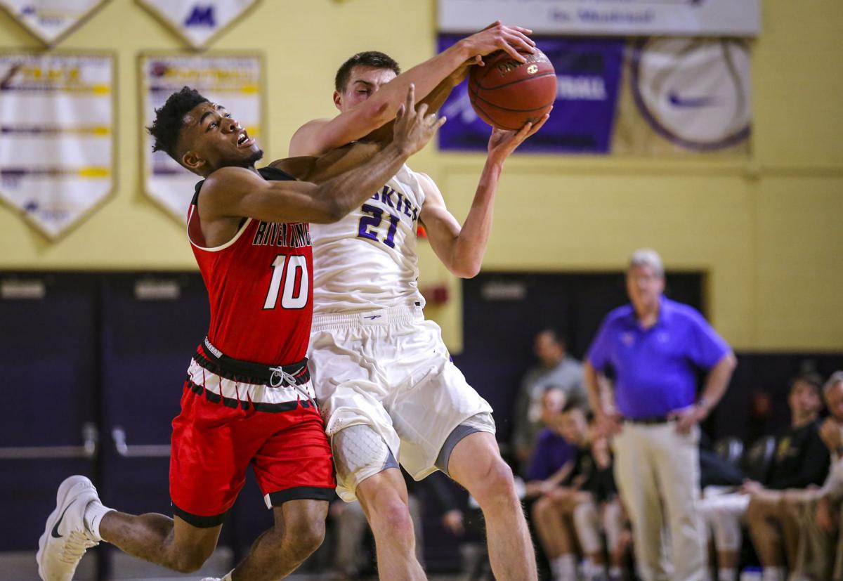Photos Clinton basketball at Muscatine High School Boys Basketball
