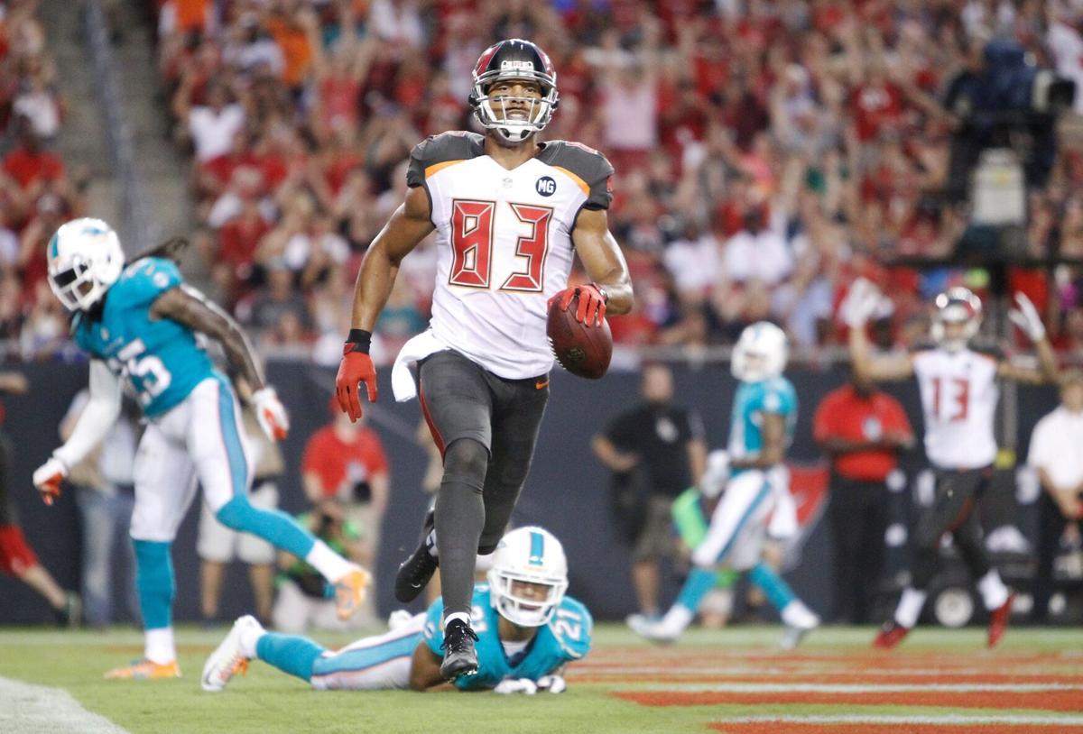 Tampa Bay Buccaneers wide receiver Vincent Jackson scores a 7- yard touchdown on a pass from Josh McCown against the Miami Dolphins at Raymond James Stadium in Tampa, Fla., on Saturday, August 16, 2014.