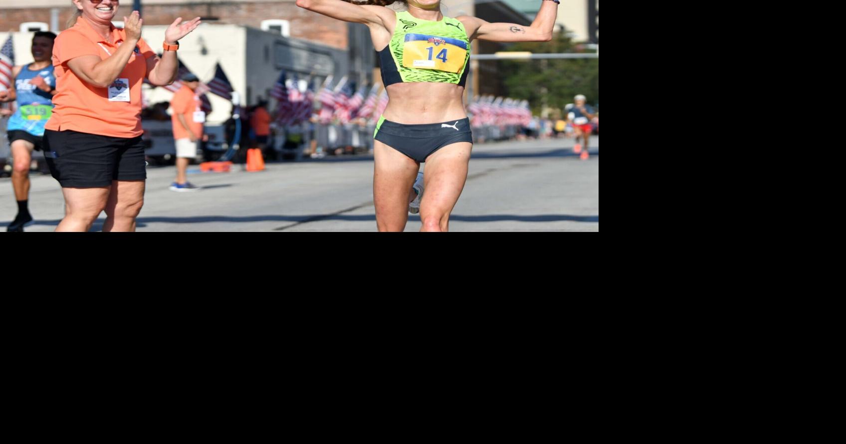 Who are the elite runners in this year's QuadCity Times Bix 7 in