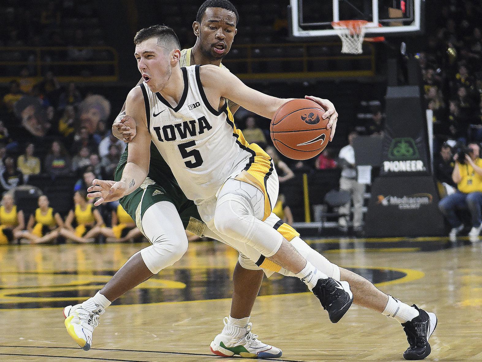 Battered Hawkeyes Open League Play With Michigan College Sports