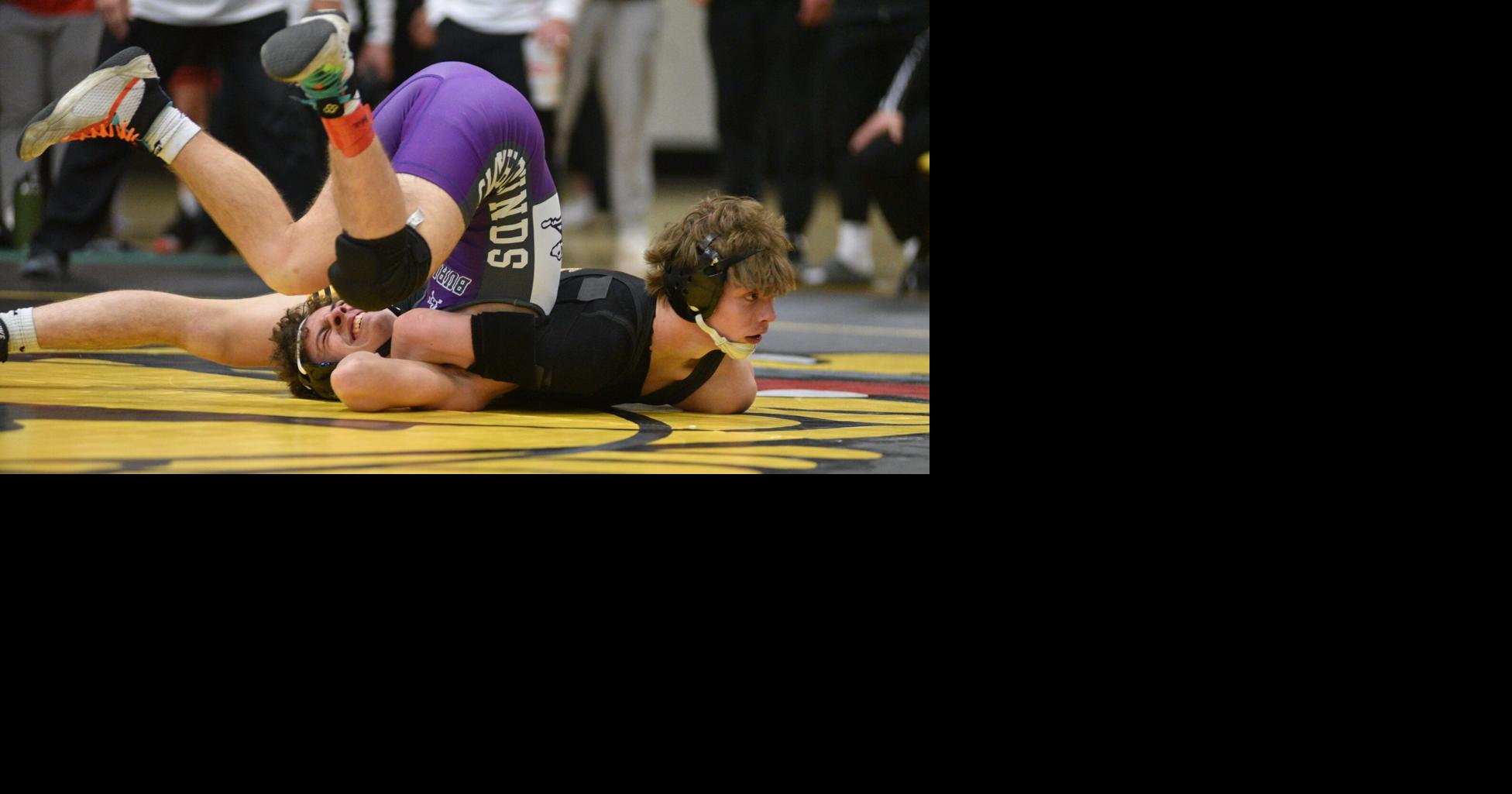 Photos: Third-place matches at the Iowa Class 3A Bettendorf District ...