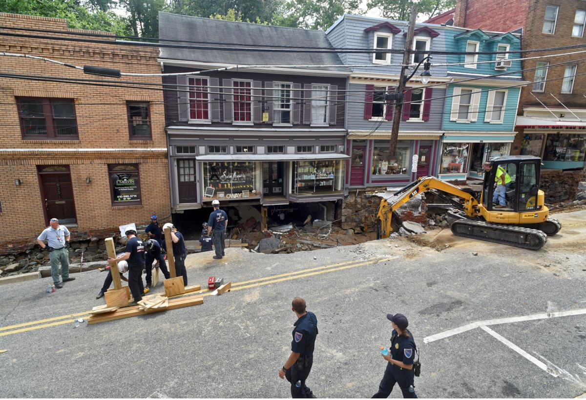 Photos Maryland flooding sweeps through historic town, killing two