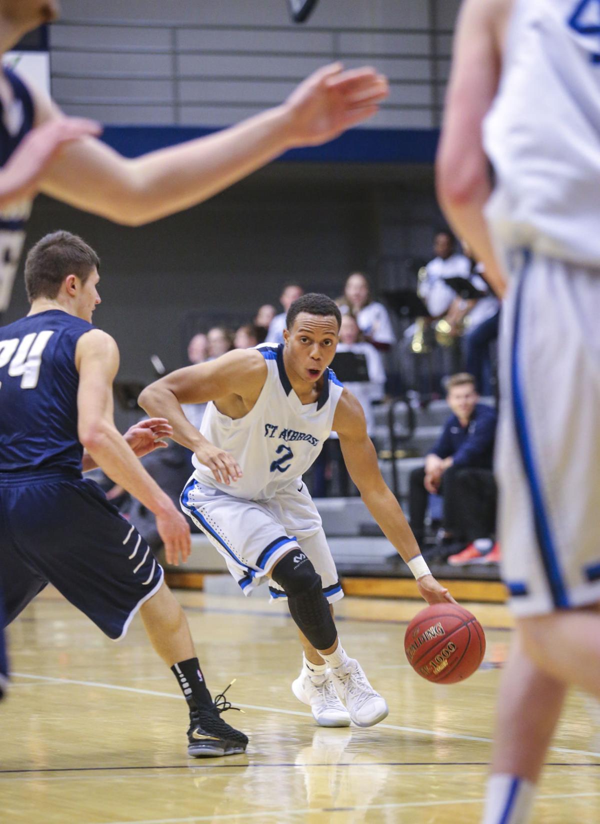 Photos Judson men's basketball at St. Ambrose College Basketball