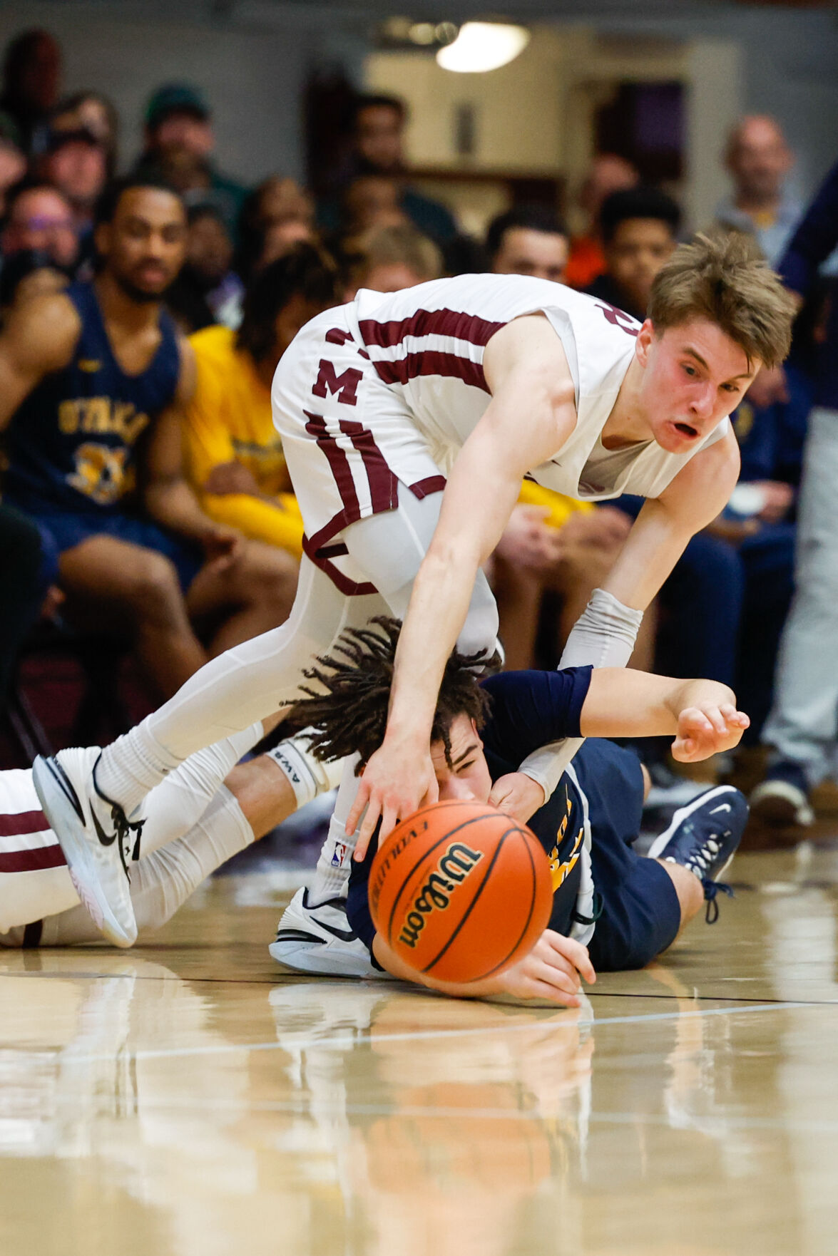 Prep boys basketball: Moline routs O'Fallon, claims first sectional title  in 19 years