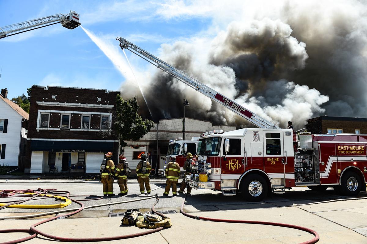 Stubborn fire takes down two East Moline downtown businesses; no one