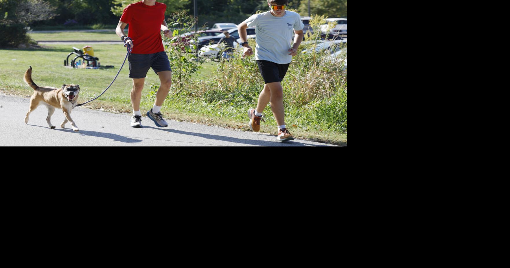Rock Island runners help animal shelter by running with dogs