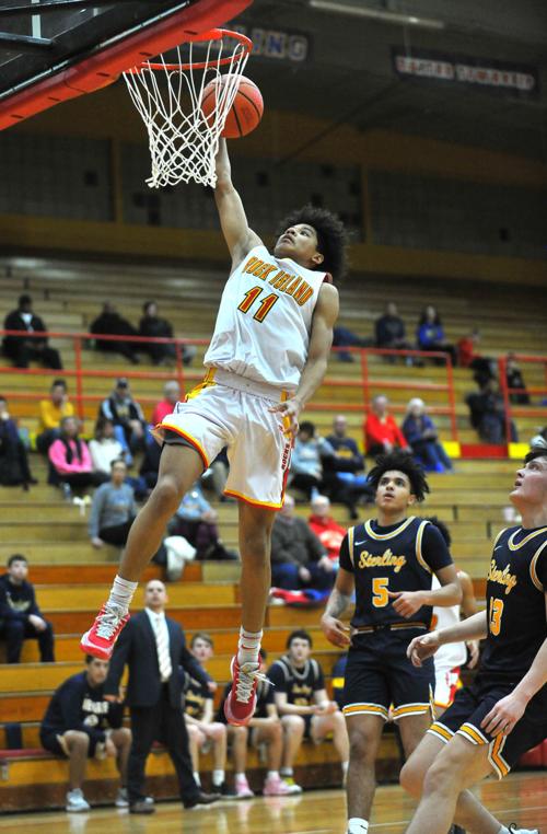 Rocks Run Past Rockford Auburn High School Boys Basketball