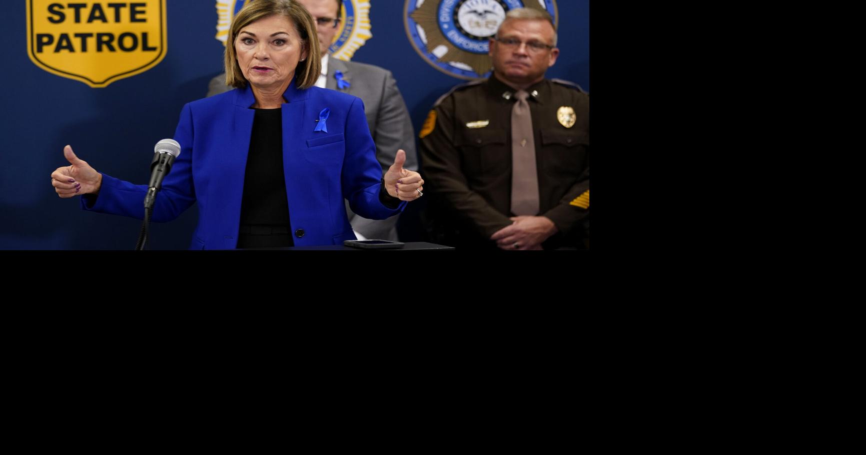 Iowa Gov. Reynolds defends library book restriction law as schools pull books from shelves