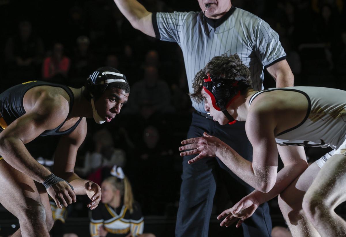 011117-BETTENDORF-WRESTLING-020