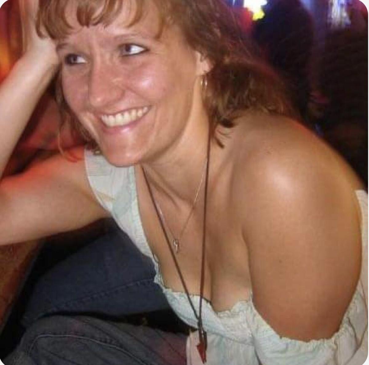 Davenport woman arrested; she lived where two bodies found